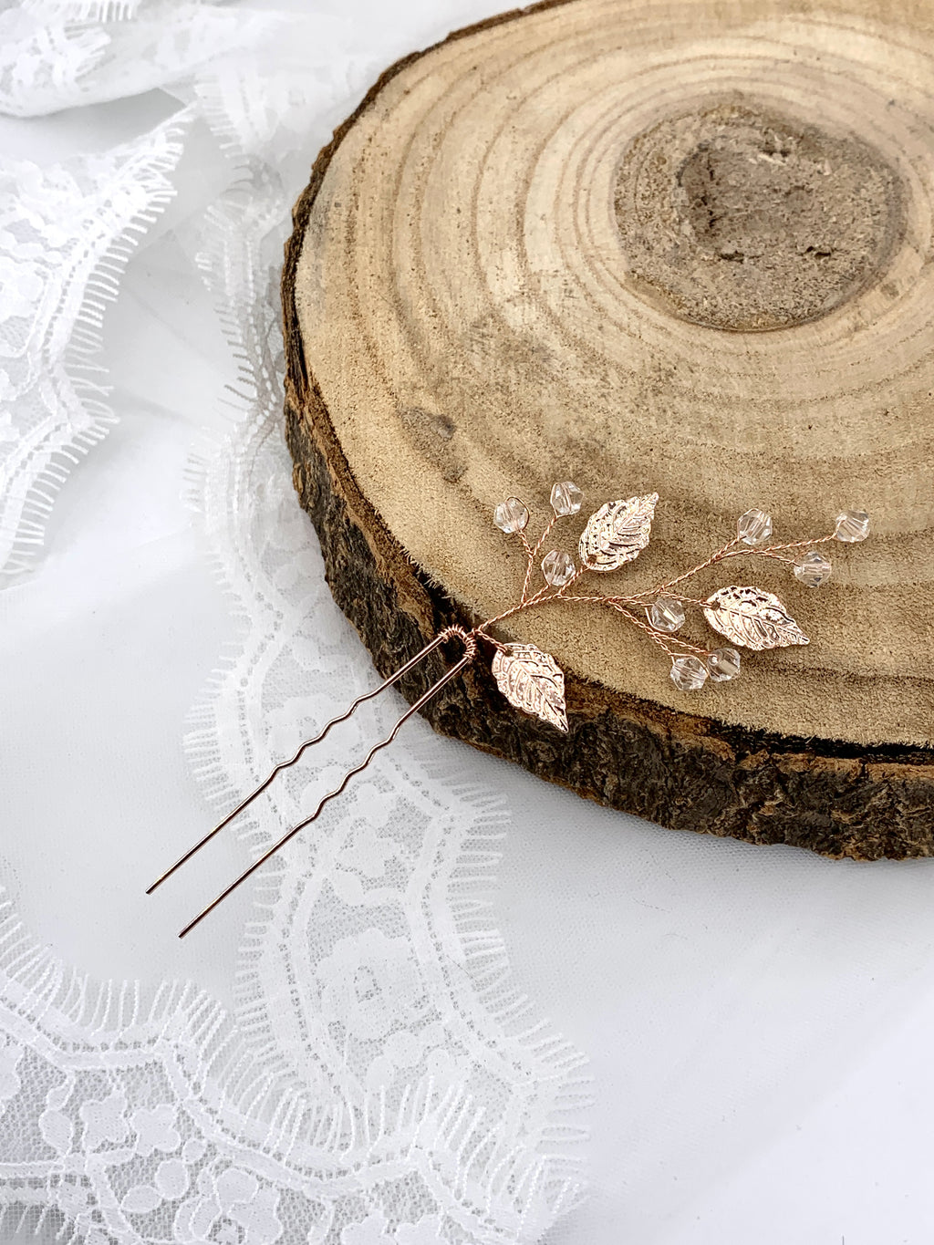 haarschmuck-rosegold-brautfrisur-mit-blaettern-und-steinen