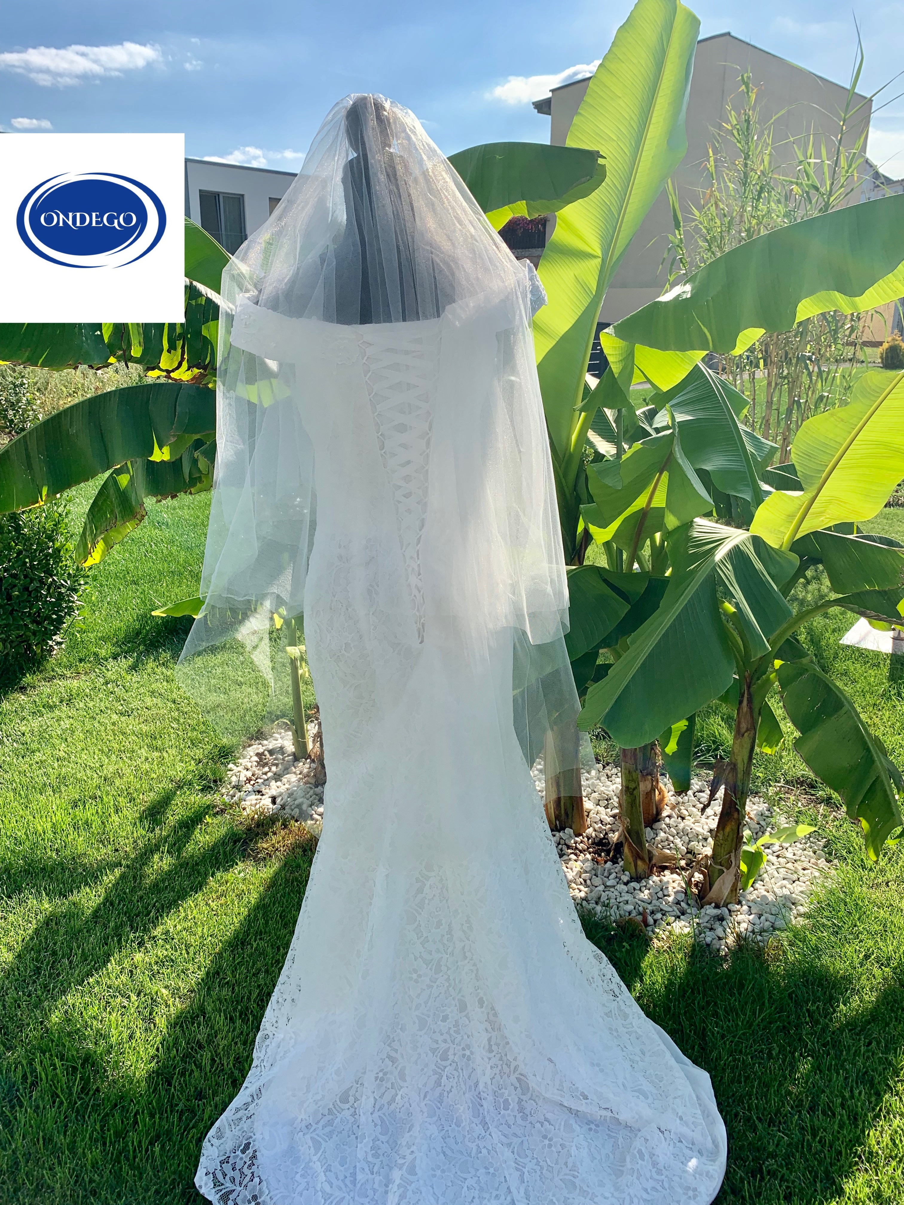 kathedral-schleier-braut-gartenaufnahme