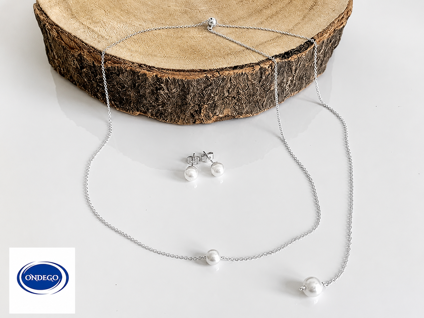 silbernes-schmuckset-mit-perlen-ohrsteckern