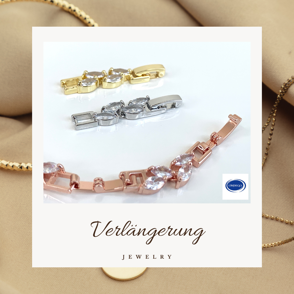 zirkonia-verlaengerung-schmuck-rosa-gold-gold-silber-auf-holz-darstellung-armband-kette-ondego